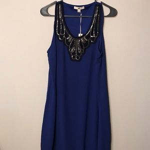 Formal blue dress with jeweled collar